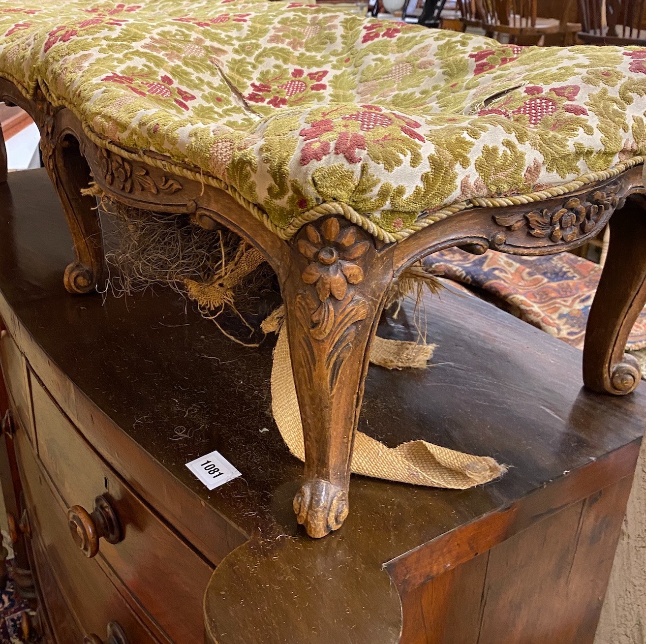 A 19th century French carved beech serpentine footstool, length 108cm